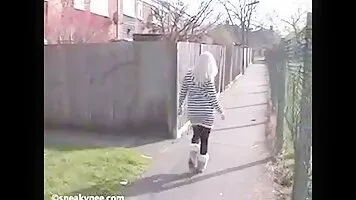 Blonde pissing in the alley