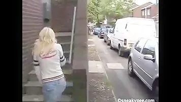 Blonde pissing on the porch