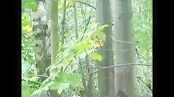 Chick pissing in the bushes