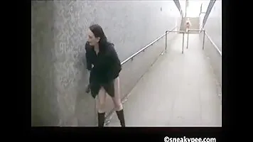 Chick pissing in the underpass