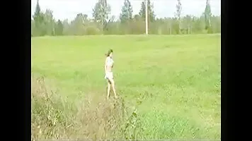 Alenka pee in a field