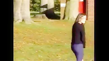 Beautiful brunette pee in the street