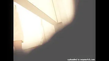 Sexy butted gal waves ass in thong on dressing room