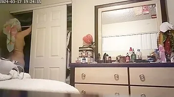 Wife changing after showering