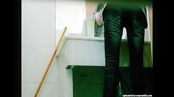 Hot upskirt pissing videos filmed in a public toilet.