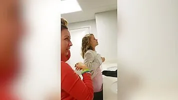 Three-way breastfeeding in public bathroom (HD 1080)