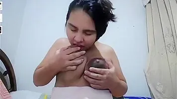 Cute natural latina with large dark milky areolas