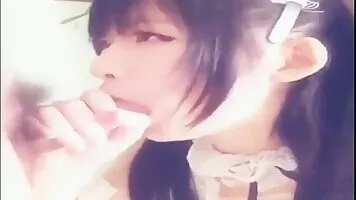 Japanese maid takes a mouthful of cum