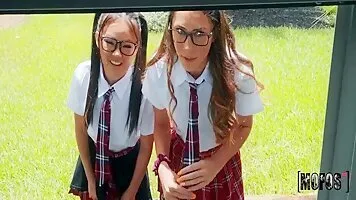 Two hot schoolgirl cosplayers share a big cock and cum hard