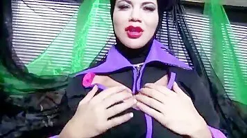 Maleficent Cosplay Slut With Big Fake Tits Fucking Both Her Holes With a Big Dildo