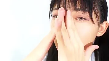 Japanese schoolgirl cosplayer plays with herself with realistic dildo