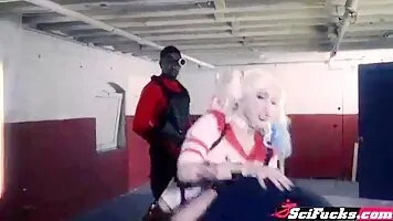 Harley Quinn cosplayer plays with Deadshots BBC