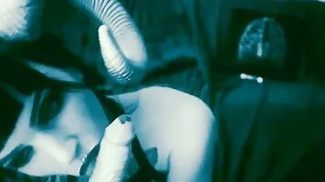 Gorgeous tattooed succubus cosplayer plays with her pussy