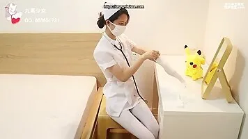 Chinese nurse cosplayer is left bound and tied up on bed